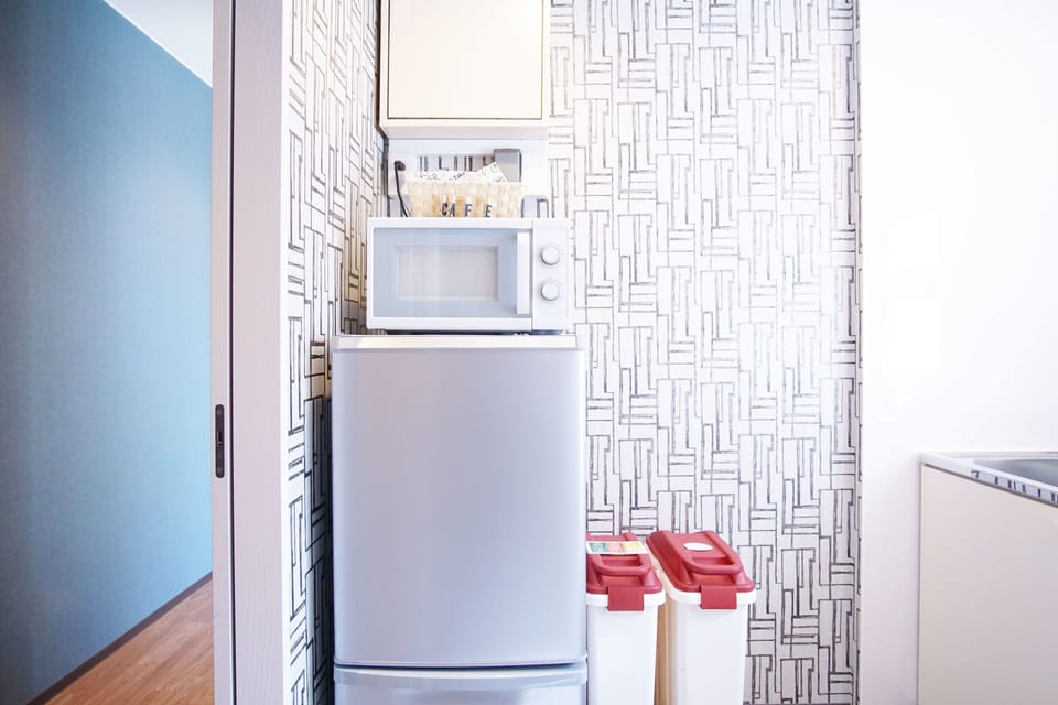 Fridge, microwave, cookware/dishes/utensils