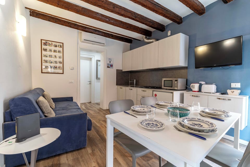 Basic Apartment, 1 Bedroom, River View | Living area | Flat-screen TV
