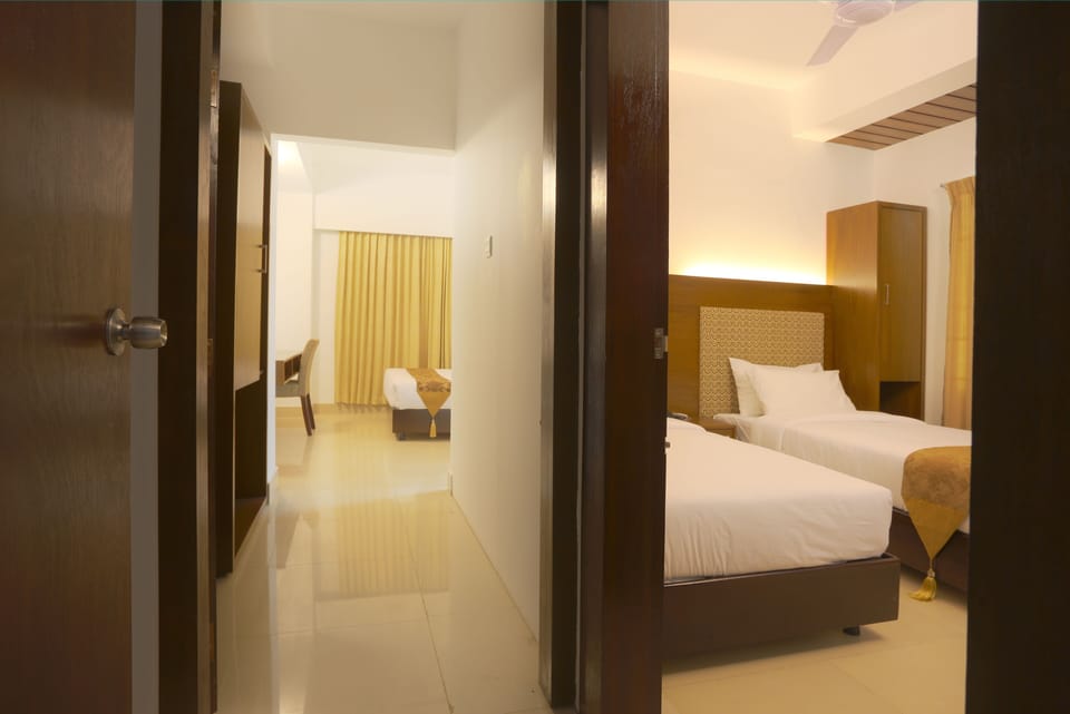 Deluxe Quadruple Room | 1 bedroom, desk, free WiFi, bed sheets