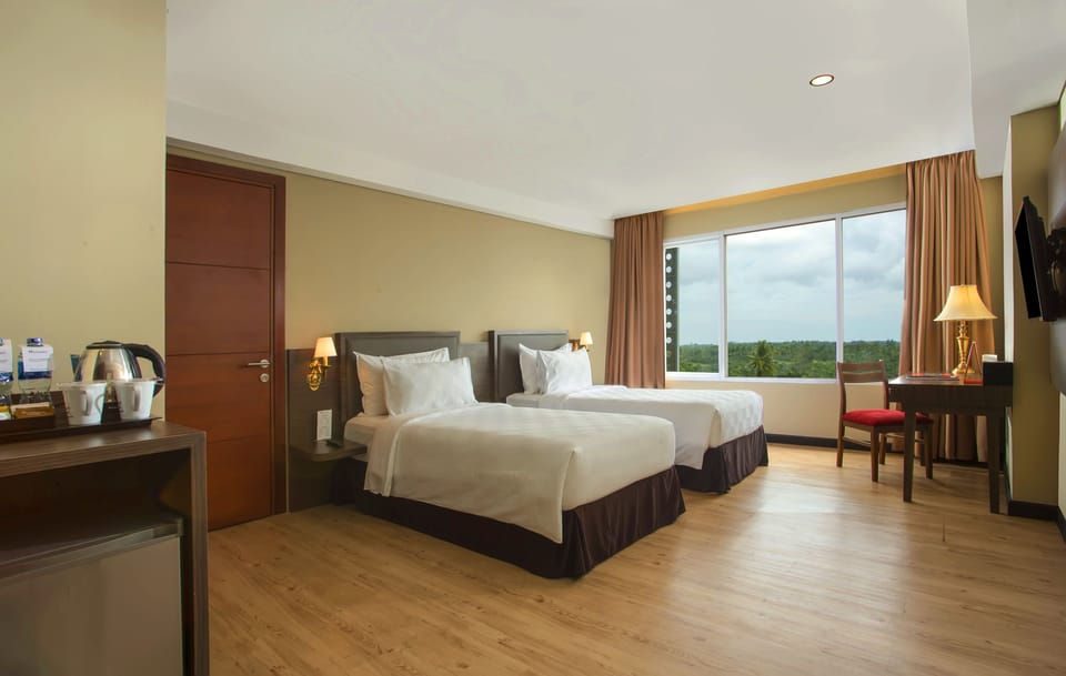 Grand Twin Room | Minibar, in-room safe, desk, iron/ironing board (on request)