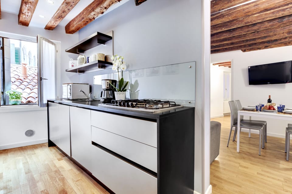 Apartment, 2 Bedrooms | Private kitchen | Full-size fridge, microwave, stovetop, dishwasher