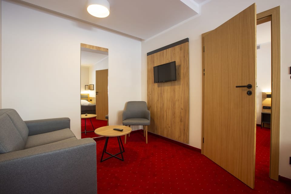 Comfort Suite, 2 Bedrooms, Non Smoking | Living area | Flat-screen TV