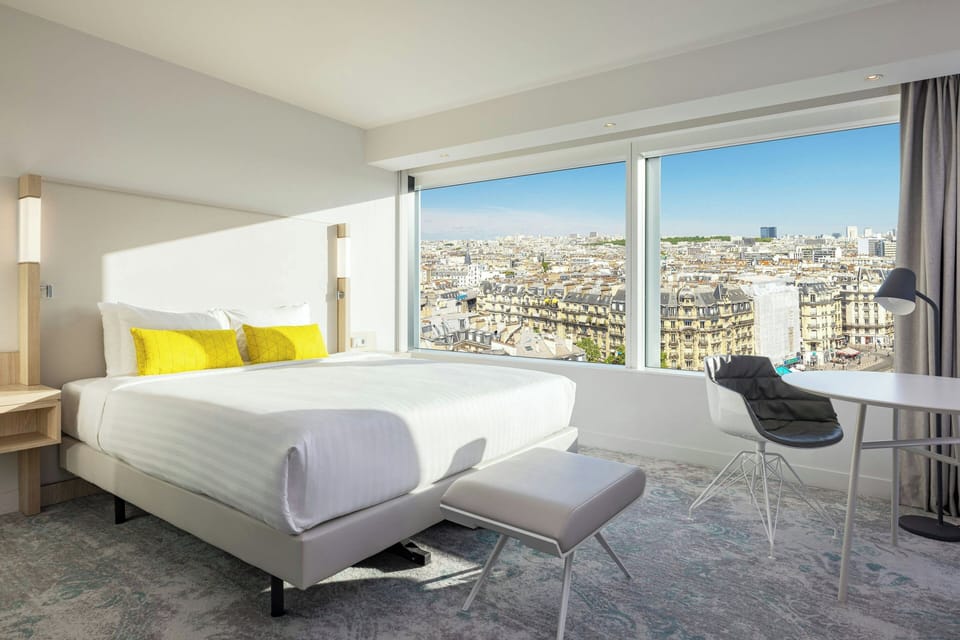 Parisian King | Premium bedding, in-room safe, desk, blackout drapes