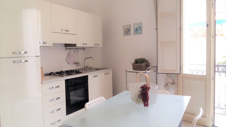 Family Apartment, 1 Bedroom | Private kitchenette | Stovetop, cookware/dishes/utensils, freezer