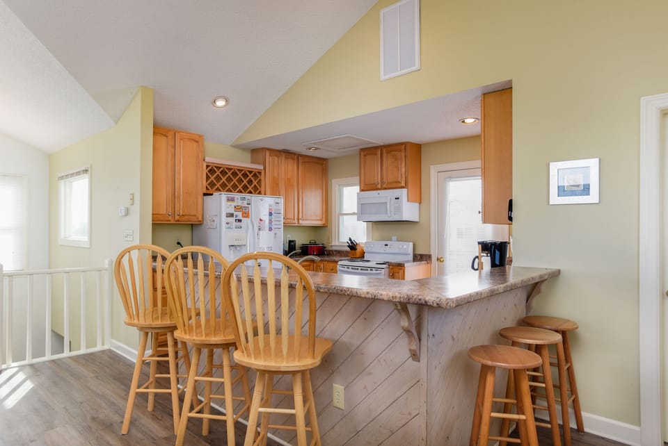 SS61: Dolphin Waves l Top Level Kitchen