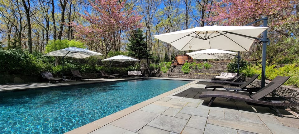 Pool Chaise Lounges with Market umbrellas