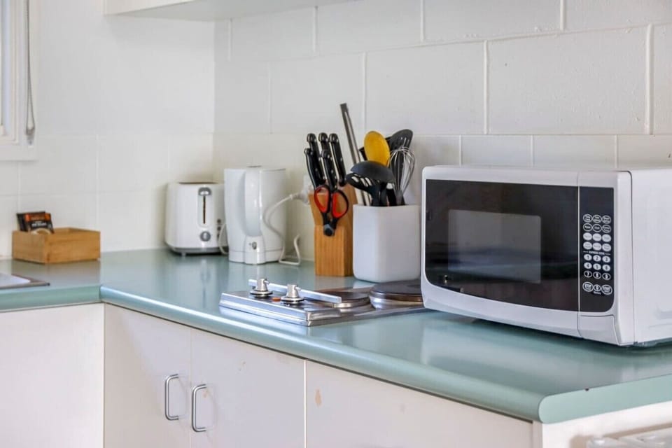 Fully equipped kitchenette with kettle, toaster and everyday cooking essentials.
