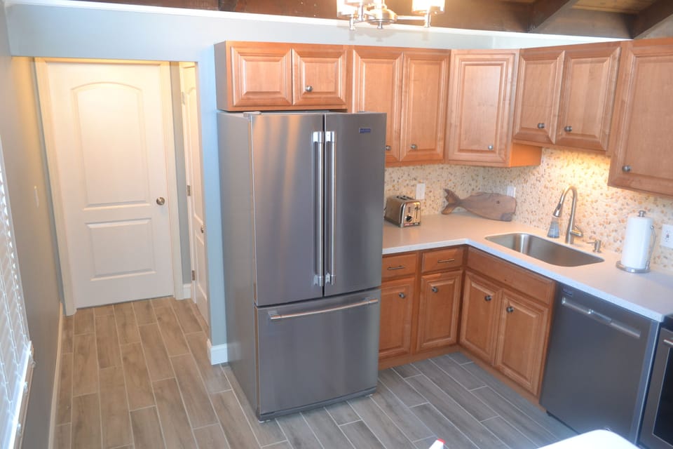 Kitchen, Hallway Leads to Mudroom, Family Room, Garage