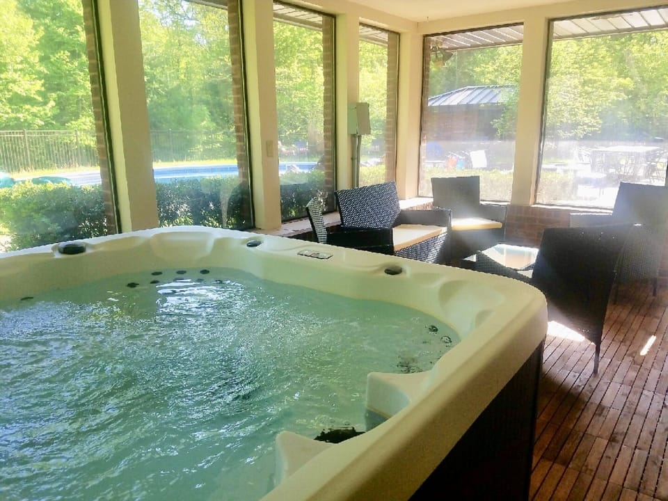 hot tub room look out to the beautiful backyard