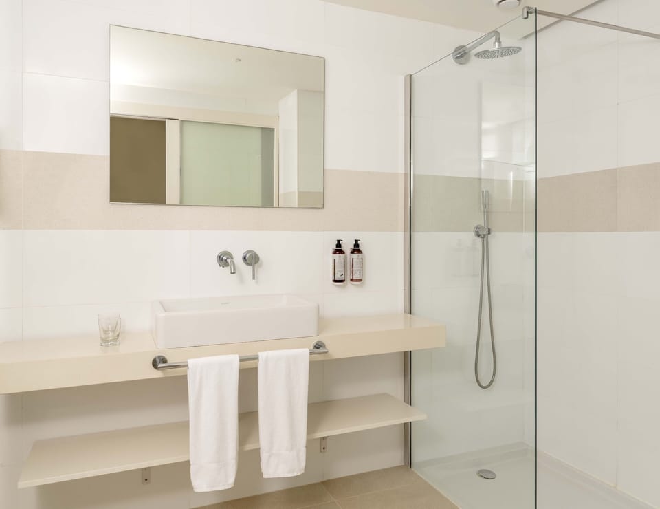 Shower, rainfall showerhead, eco-friendly toiletries, hair dryer