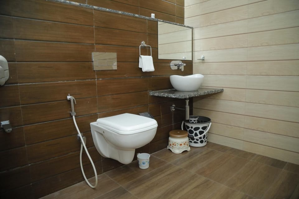 Shower, free toiletries, slippers, towels