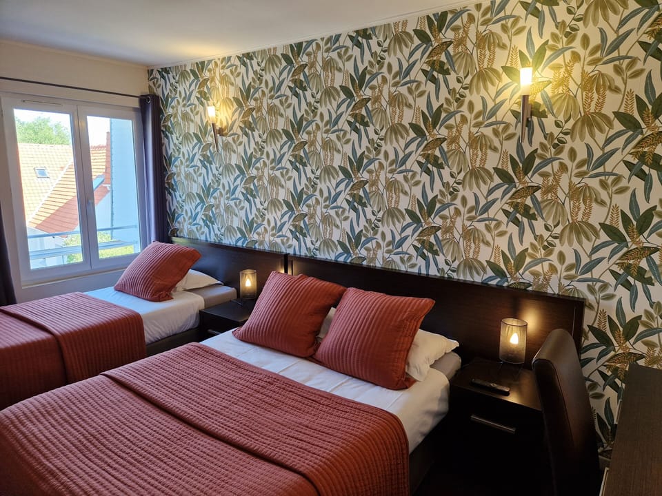 Standard Triple Room | Desk, blackout drapes, iron/ironing board, free WiFi