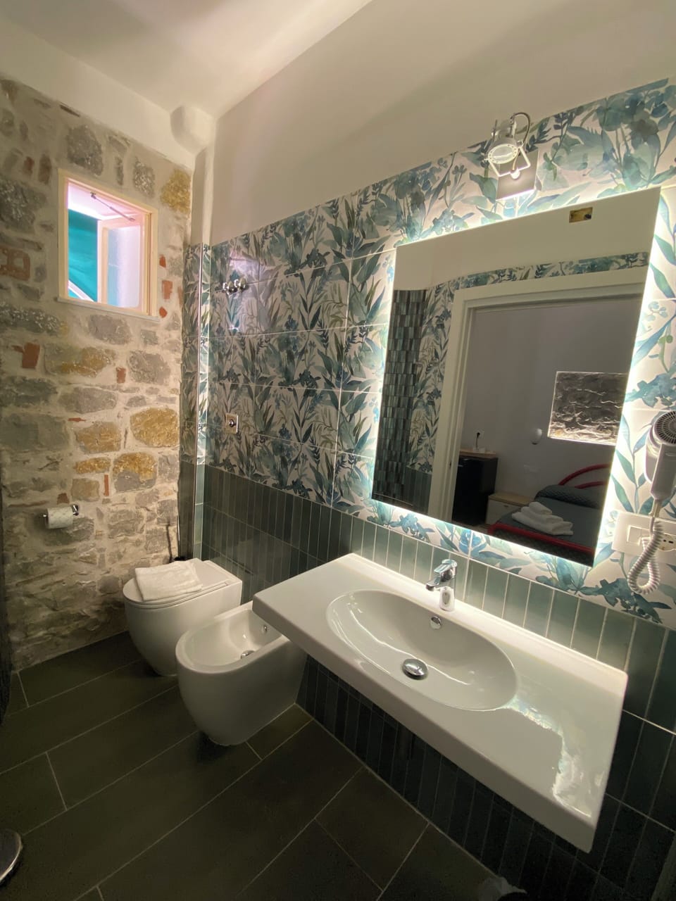 Standard Suite, 2 Bedrooms, Balcony | Bathroom | Shower, rainfall showerhead, free toiletries, hair dryer