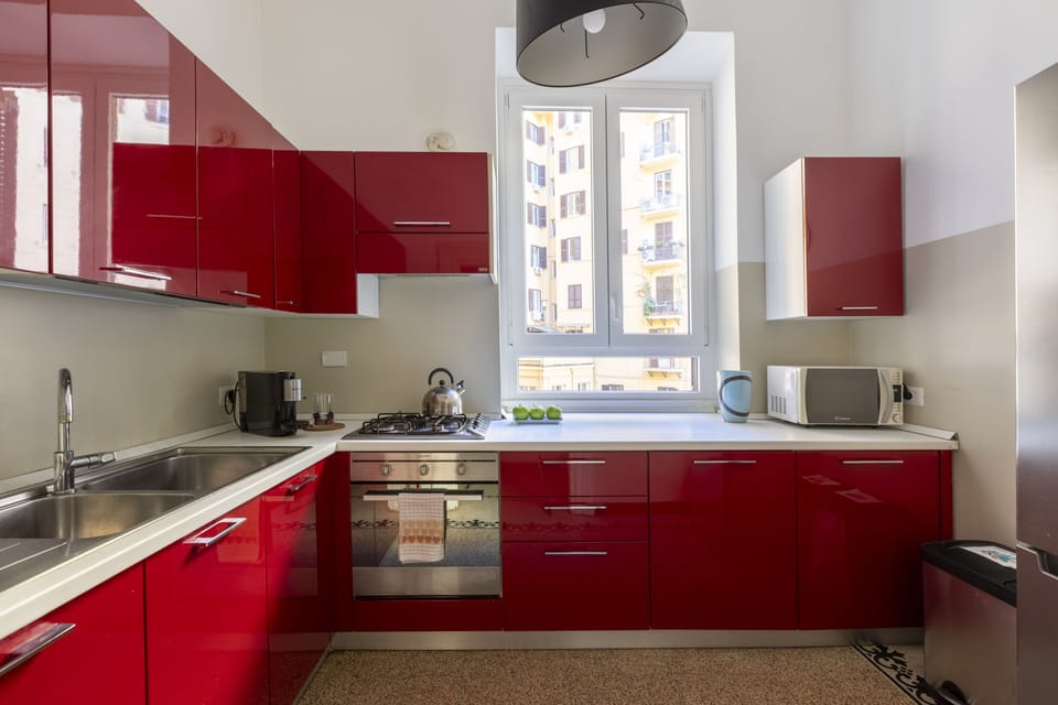 Apartment, 5 Bedrooms | Private kitchen | Full-size fridge, microwave, oven, stovetop