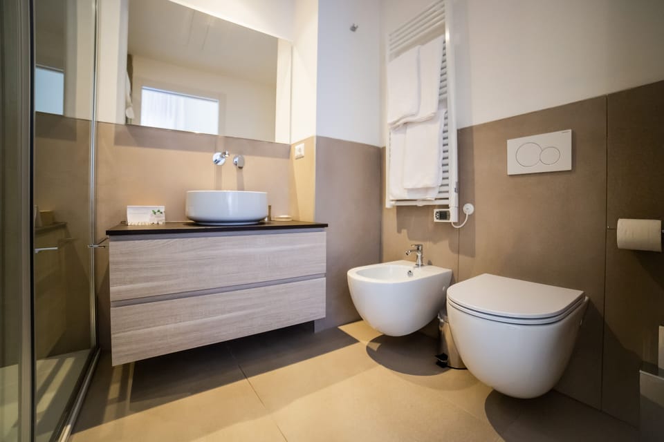 Shower, free toiletries, slippers, bidet