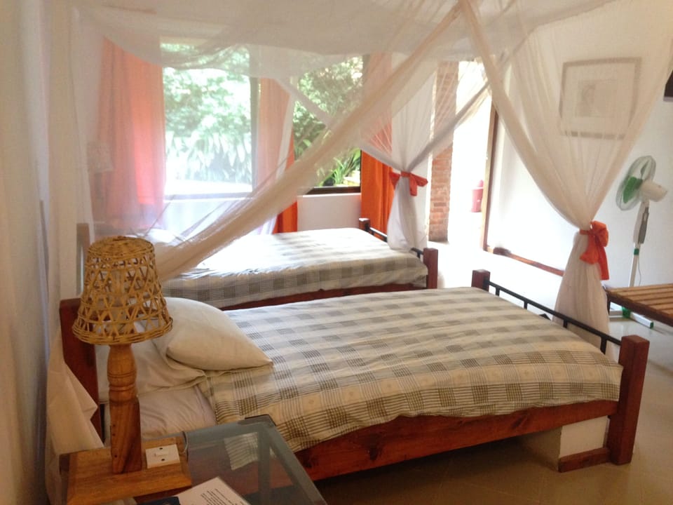 Double or Twin Room | In-room safe, bed sheets