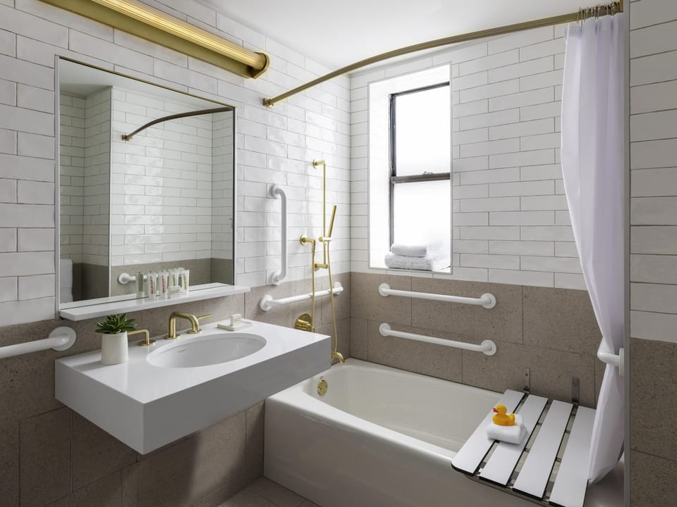 Designer toiletries, hair dryer, bathrobes, slippers