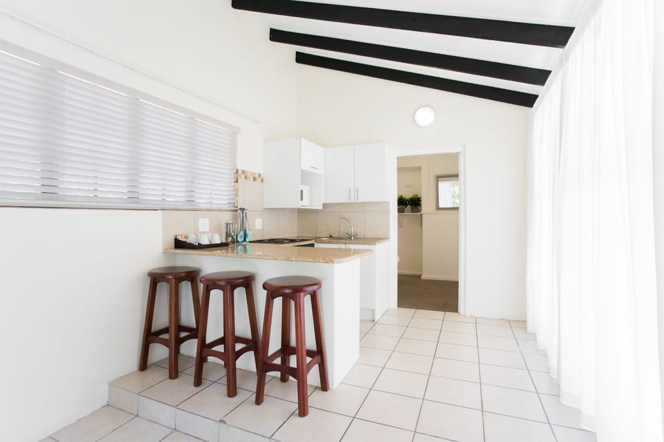 Standard Apartment, 2 Bedrooms, Refrigerator & Microwave, Garden View | Private kitchenette | Coffee/tea maker, electric kettle