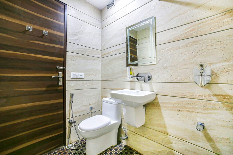 Shower, designer toiletries, towels