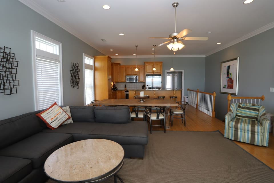 Spacious living room with plenty of seating 