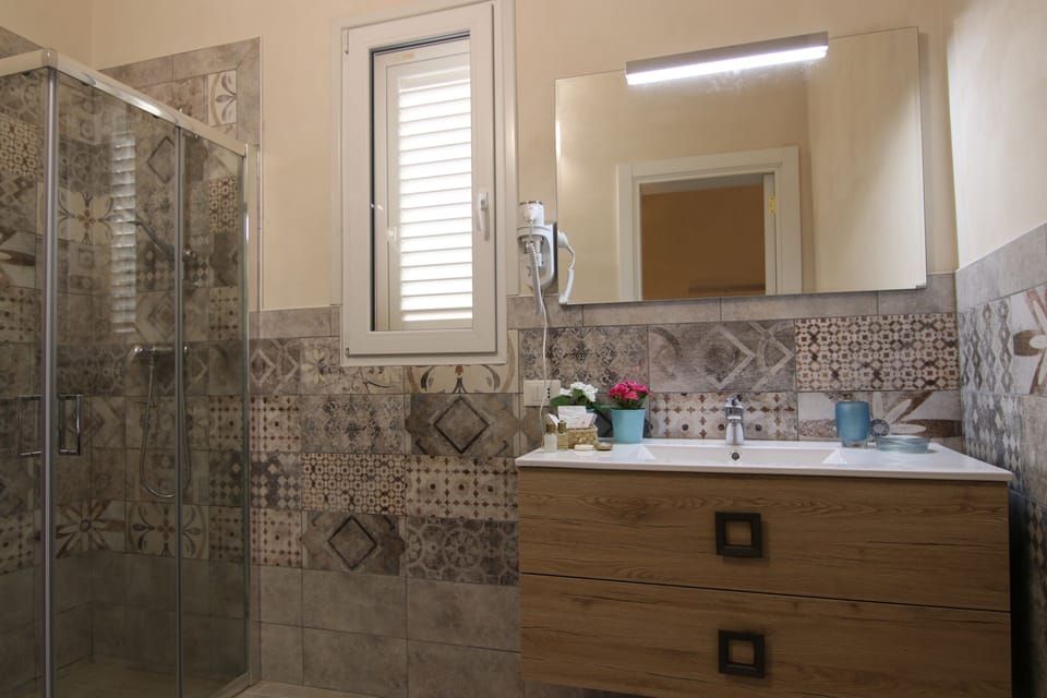 Shower, free toiletries, hair dryer, bathrobes