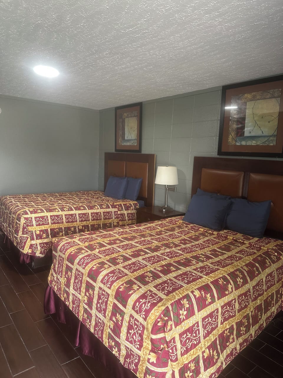 Standard Double Room, 2 Queen Beds | Bathroom | Combined shower/tub, deep soaking tub, free toiletries, hair dryer