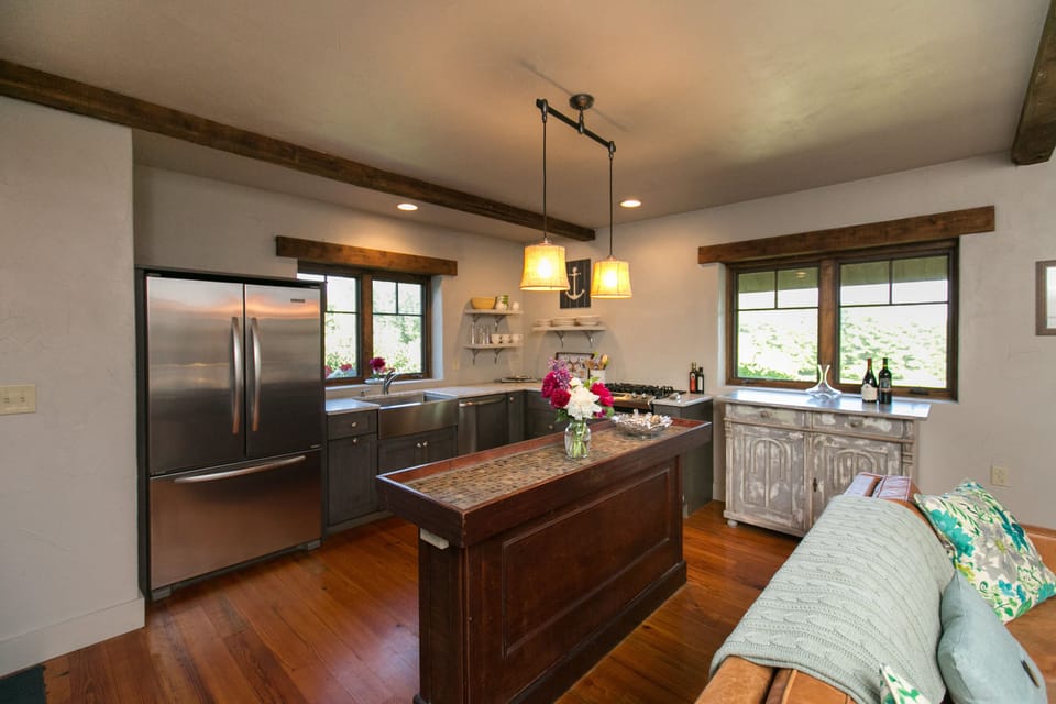 Kitchen with Carrara marble and stainless appliances
