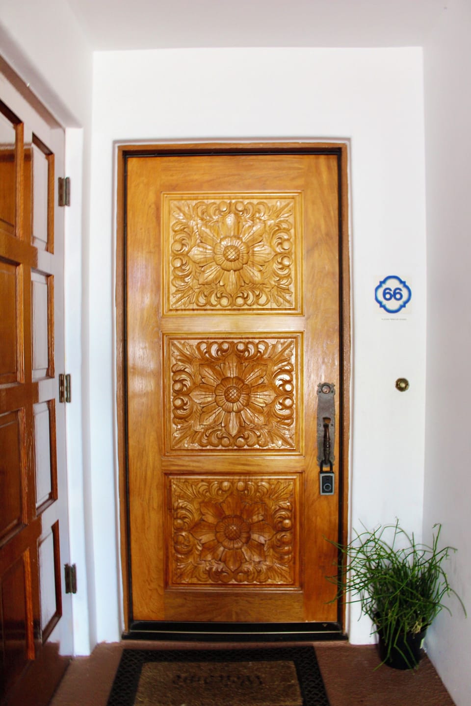 Enter through a beautifully hand carved wooden door that sets the tone for your stay.