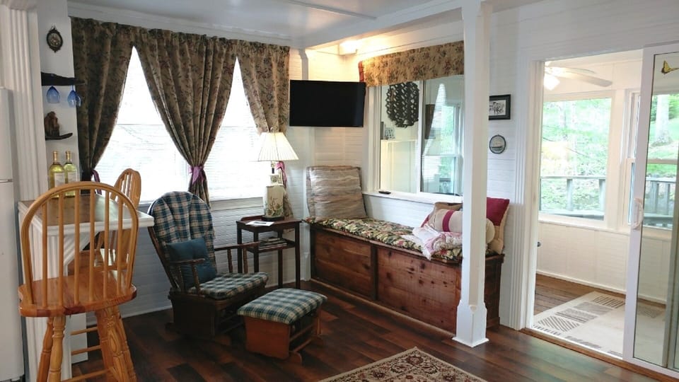 Living room with flat screen mounted on wall