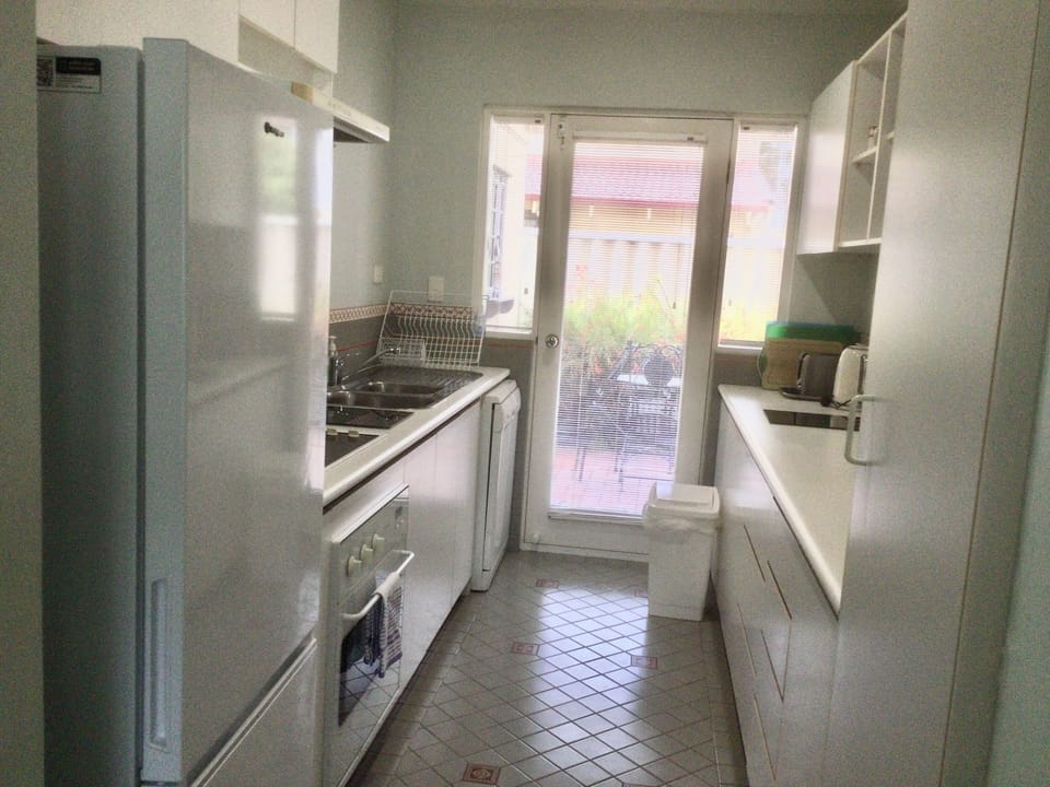 Standard House, 3 Bedrooms (1 Queen, 1 Double, 1 Tri-bunk) | Private kitchen | Full-size fridge, microwave, oven, stovetop