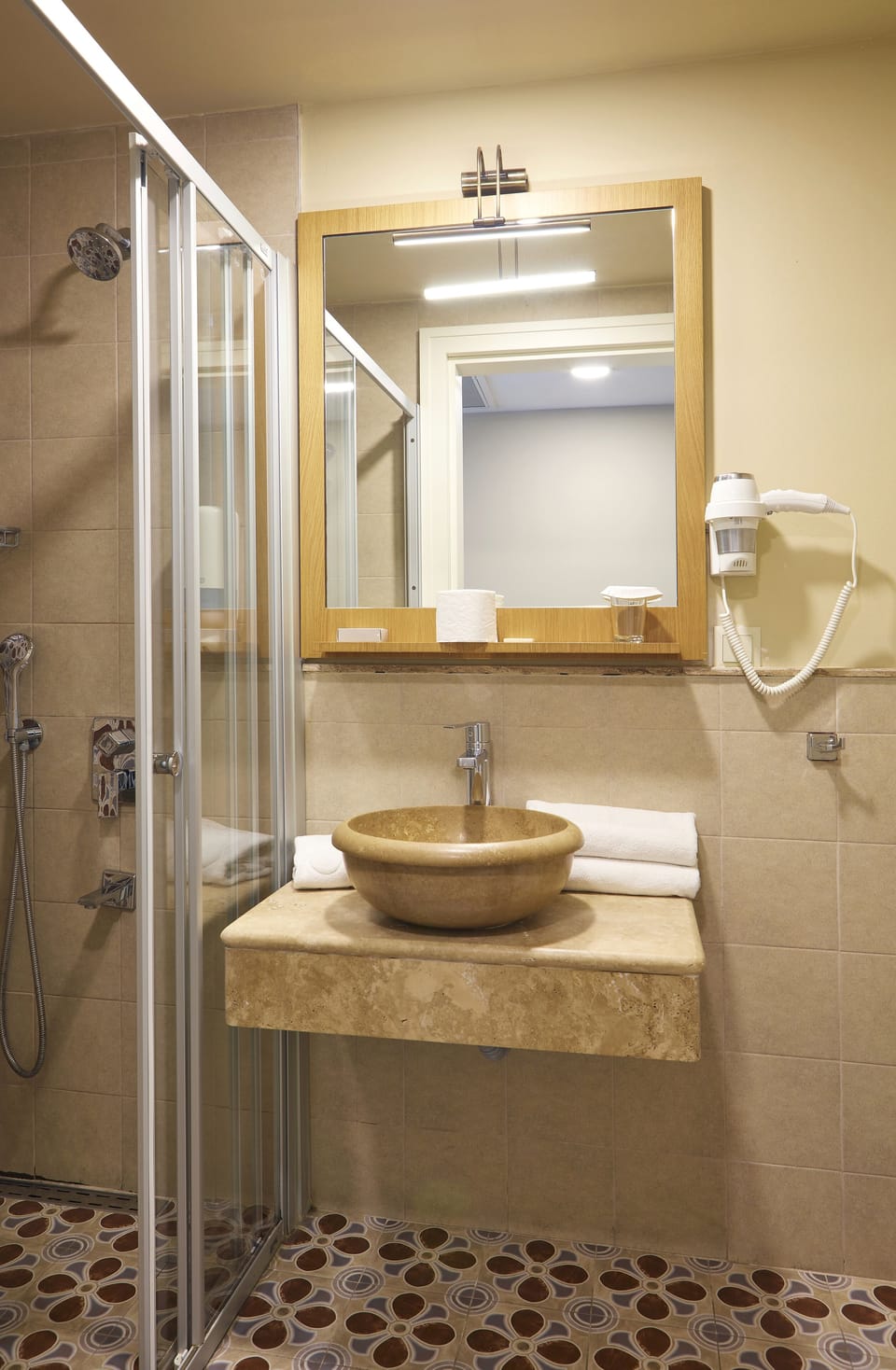 Shower, free toiletries, hair dryer, slippers