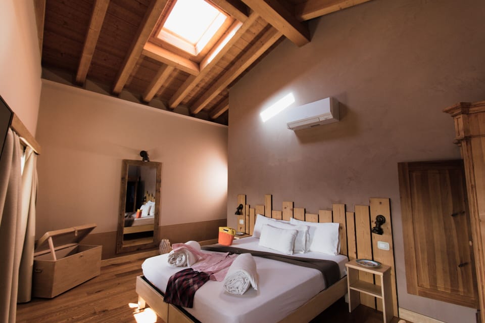 Exclusive Double Room (Garofano) | Frette Italian sheets, premium bedding, down comforters, pillowtop beds