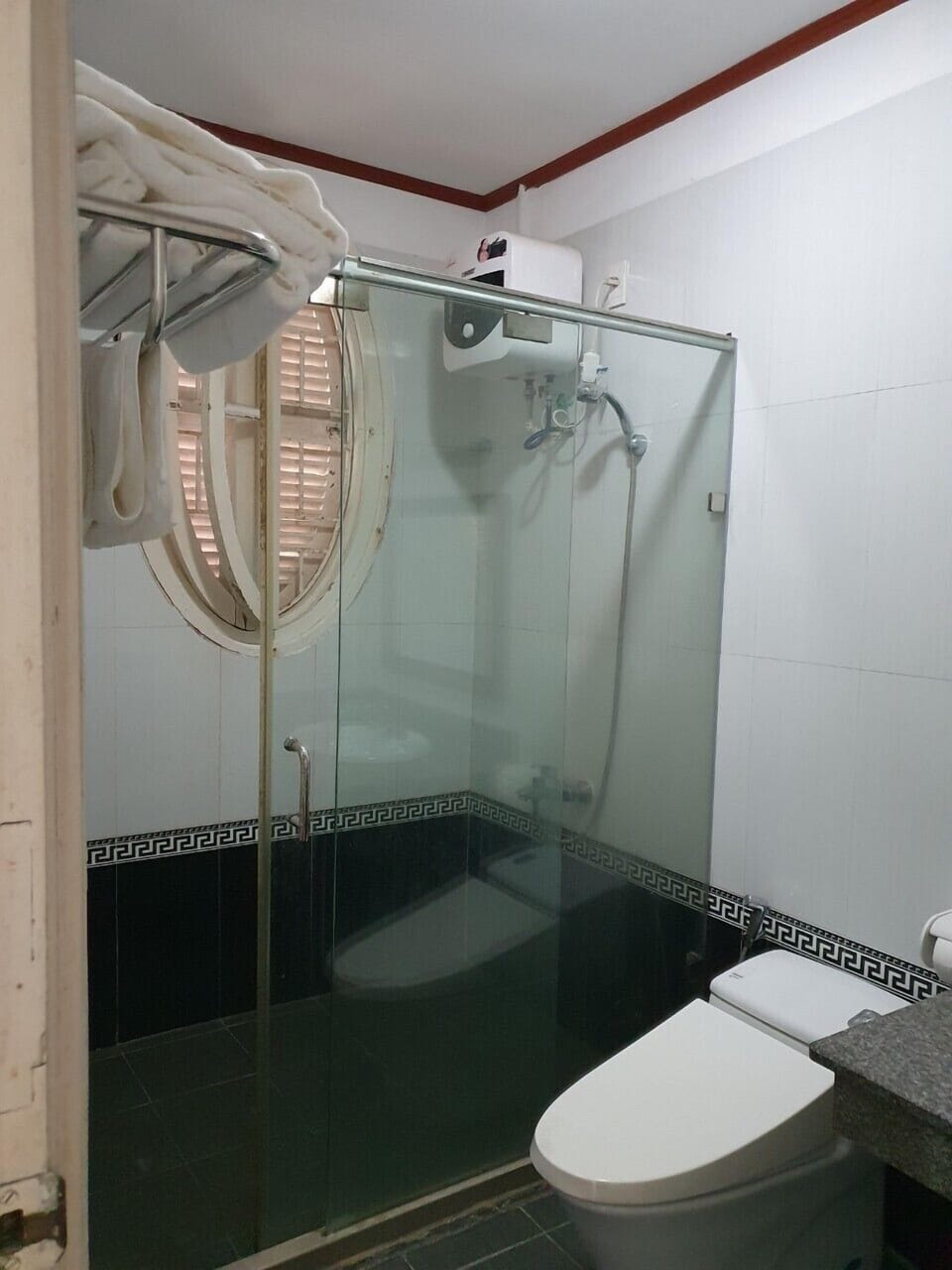 Shower, rainfall showerhead, designer toiletries, hair dryer