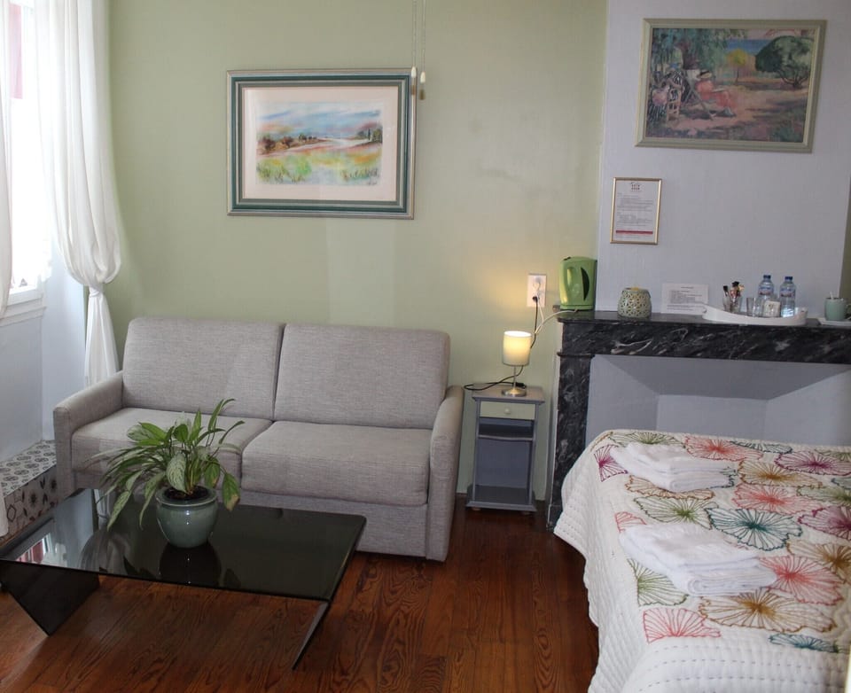 Family Suite, Private Bathroom (Chambre Magnolia) | Iron/ironing board, free WiFi, bed sheets