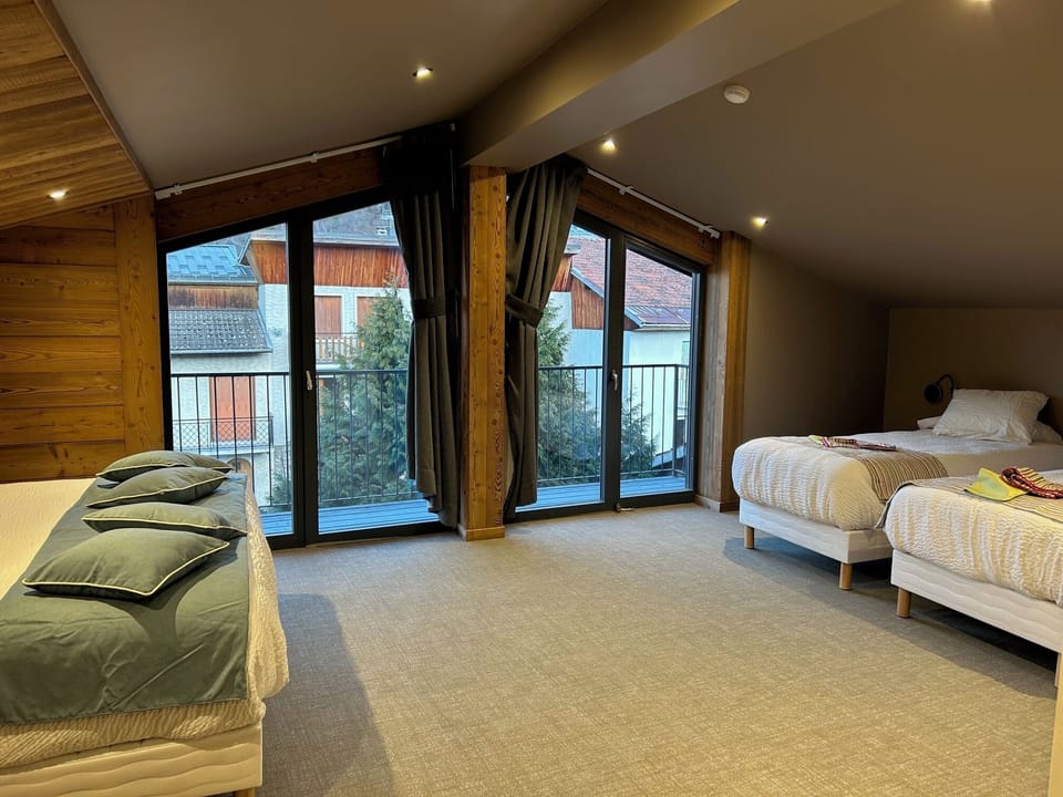 Family Quadruple Room, 2 Queen Beds | Premium bedding, individually decorated, individually furnished, desk