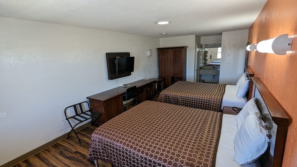 Deluxe Room, 2 Queen Beds | Desk, WiFi (free), bed sheets