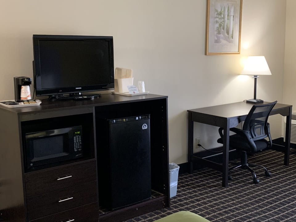 Desk, blackout drapes, iron/ironing board, cribs (free)