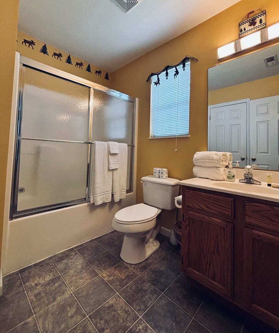 The Moose Suite bathroom with a bathtub.