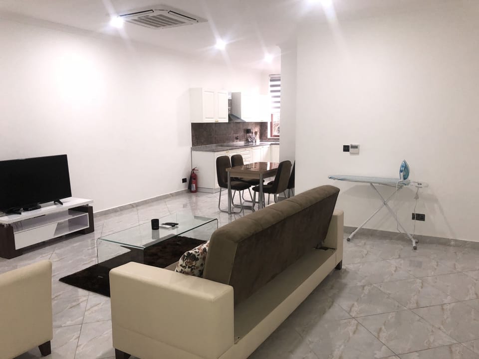 Comfort Apartment, 2 Bedrooms | Living room | Flat-screen TV