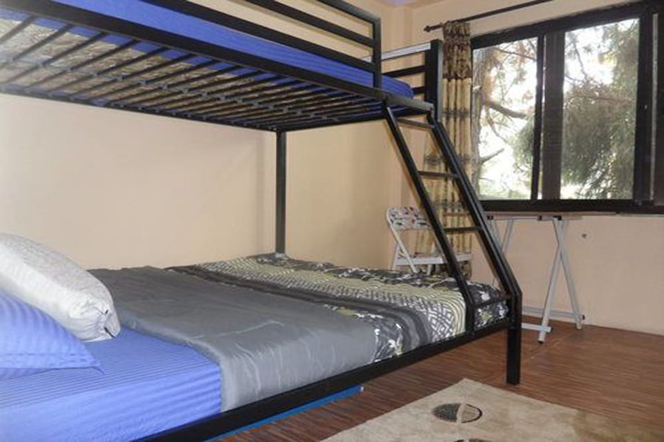 Economy Room, Multiple Beds | Desk, iron/ironing board, free WiFi, bed sheets
