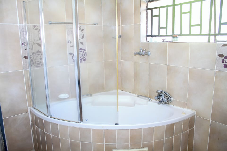 Deluxe Double Room, Garden View | 1 bedroom, premium bedding, minibar, iron/ironing board