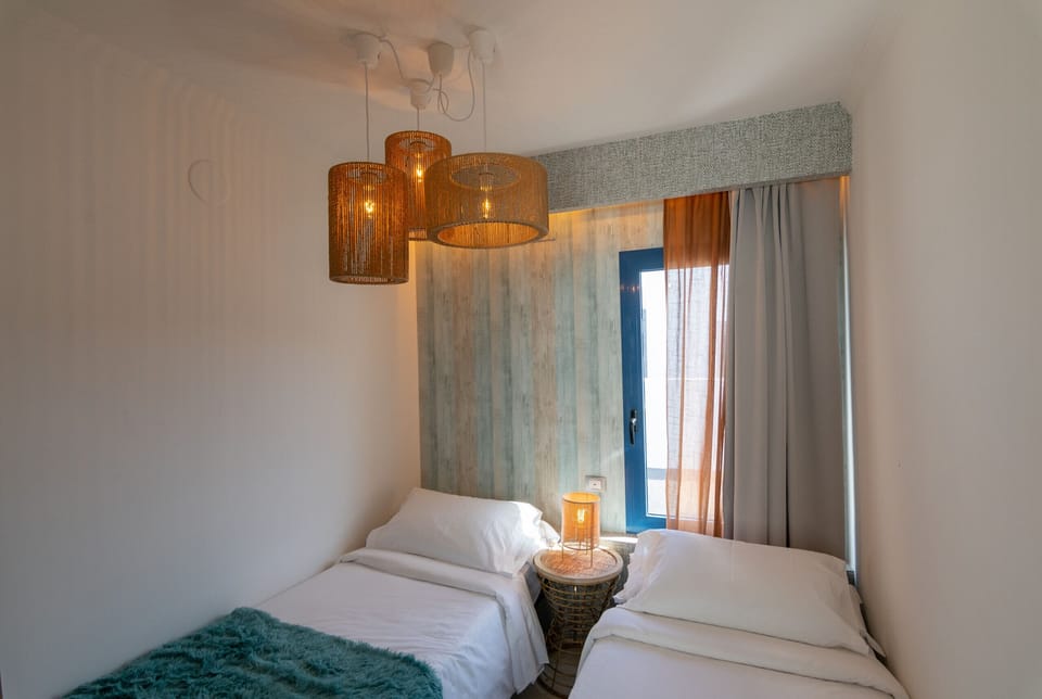 Modern bedroom with two single beds