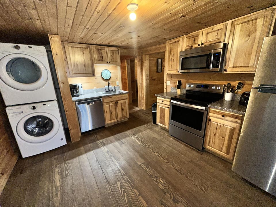 Rustic kitchen with modern appliances and cozy wood accents