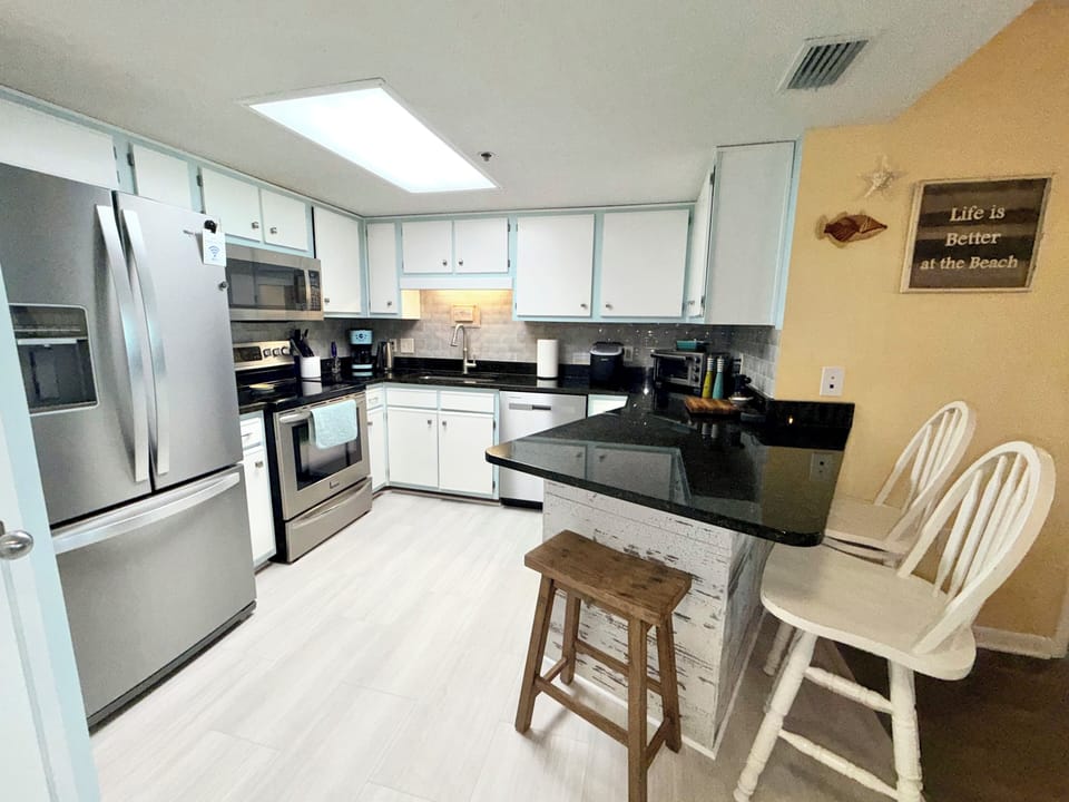 This kitchen is well stocked with gadgets for guest use