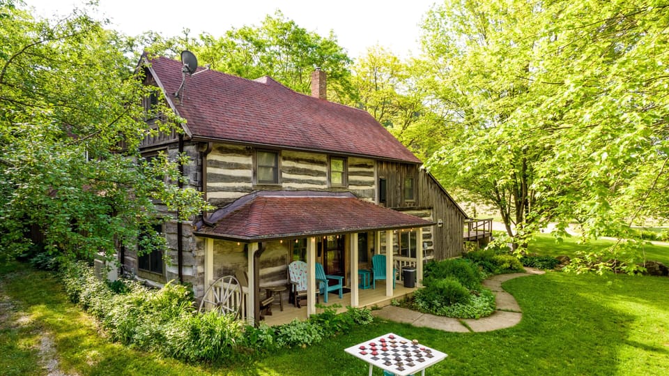 Enjoy the porch overlooking the pond.