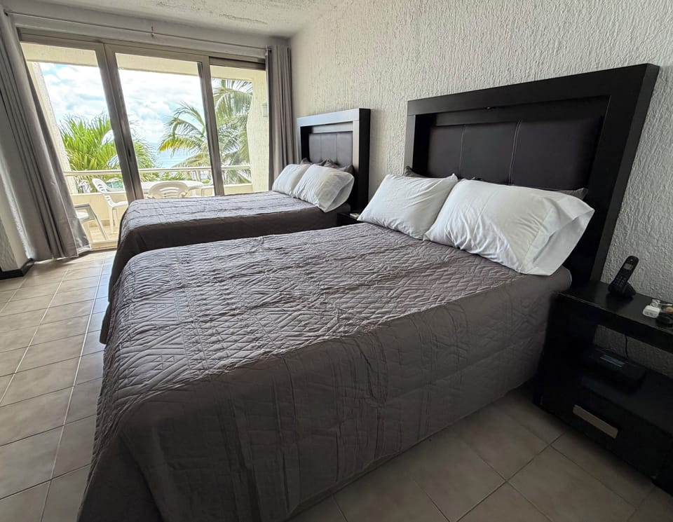 Two full size beds with brand new mattresses (2021).
