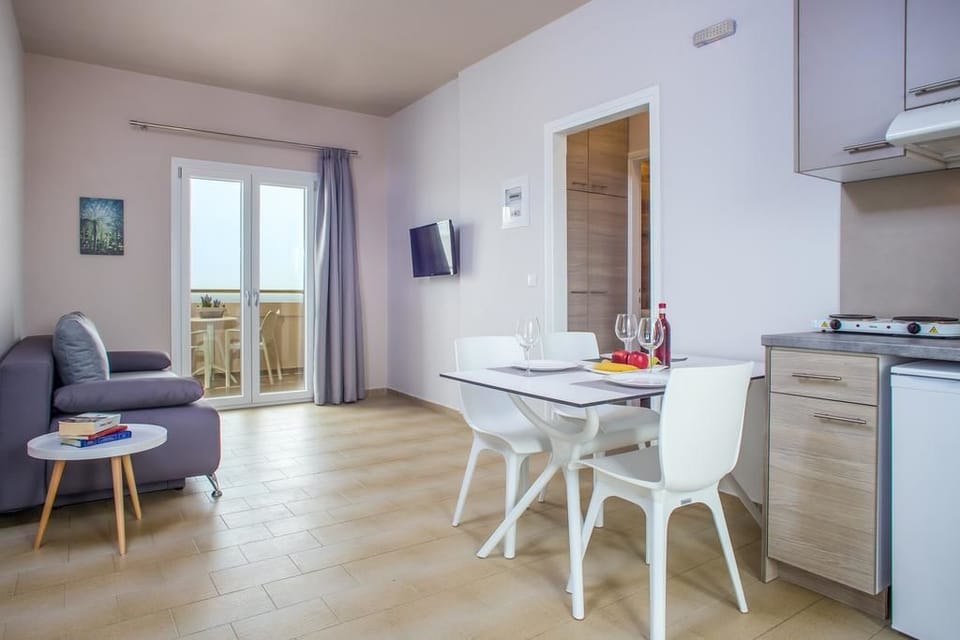 Apartment, 2 Bedrooms, Sea View | Living area | Flat-screen TV