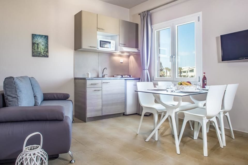 Apartment, 2 Bedrooms, Sea View | Living area | Flat-screen TV