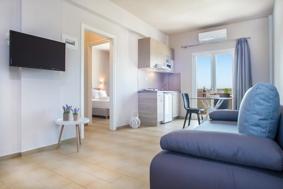 Apartment, 1 Bedroom | Living area | Flat-screen TV
