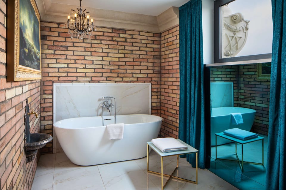Studio Suite (The Atelier Studio) | Bathroom | Shower, free toiletries, bathrobes, slippers